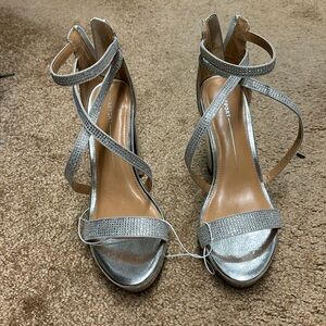 Silver platform heels size 8 by REPORT nwot